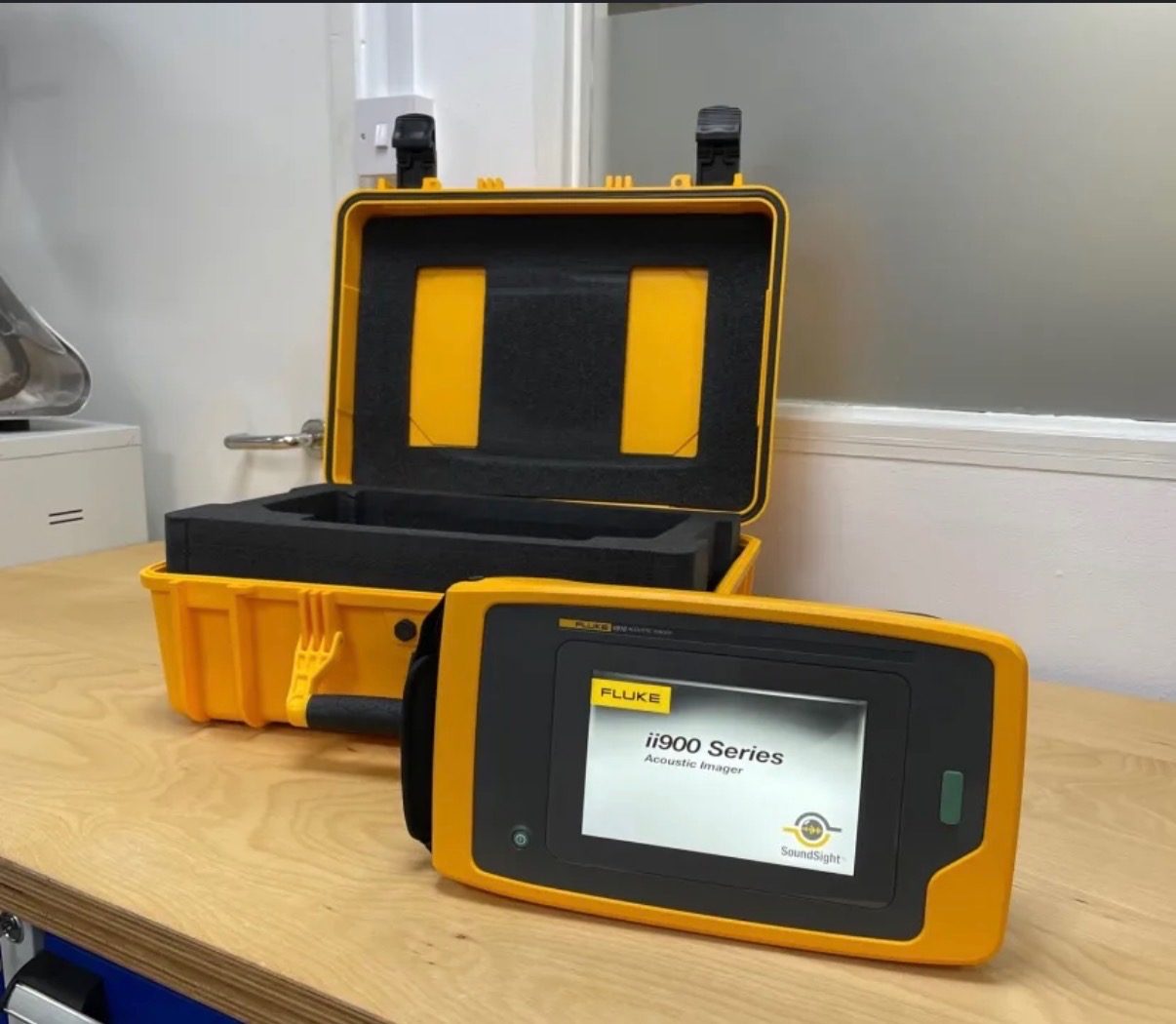 Fluke acoustic imaging camera in its protective field case, the instrument Invizions uses to detect and locate partial discharge on energized substation equipment